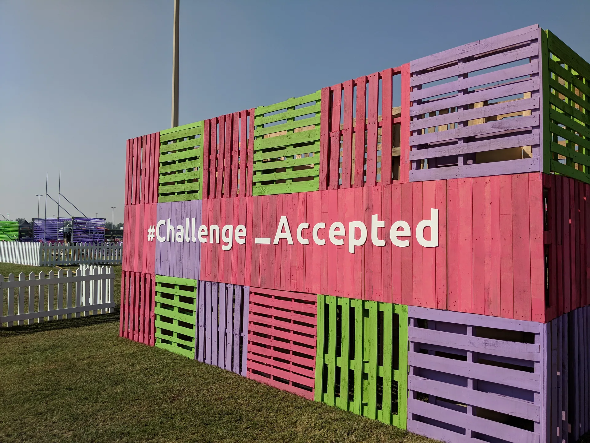Challenge Accepted wall built from painted pallets