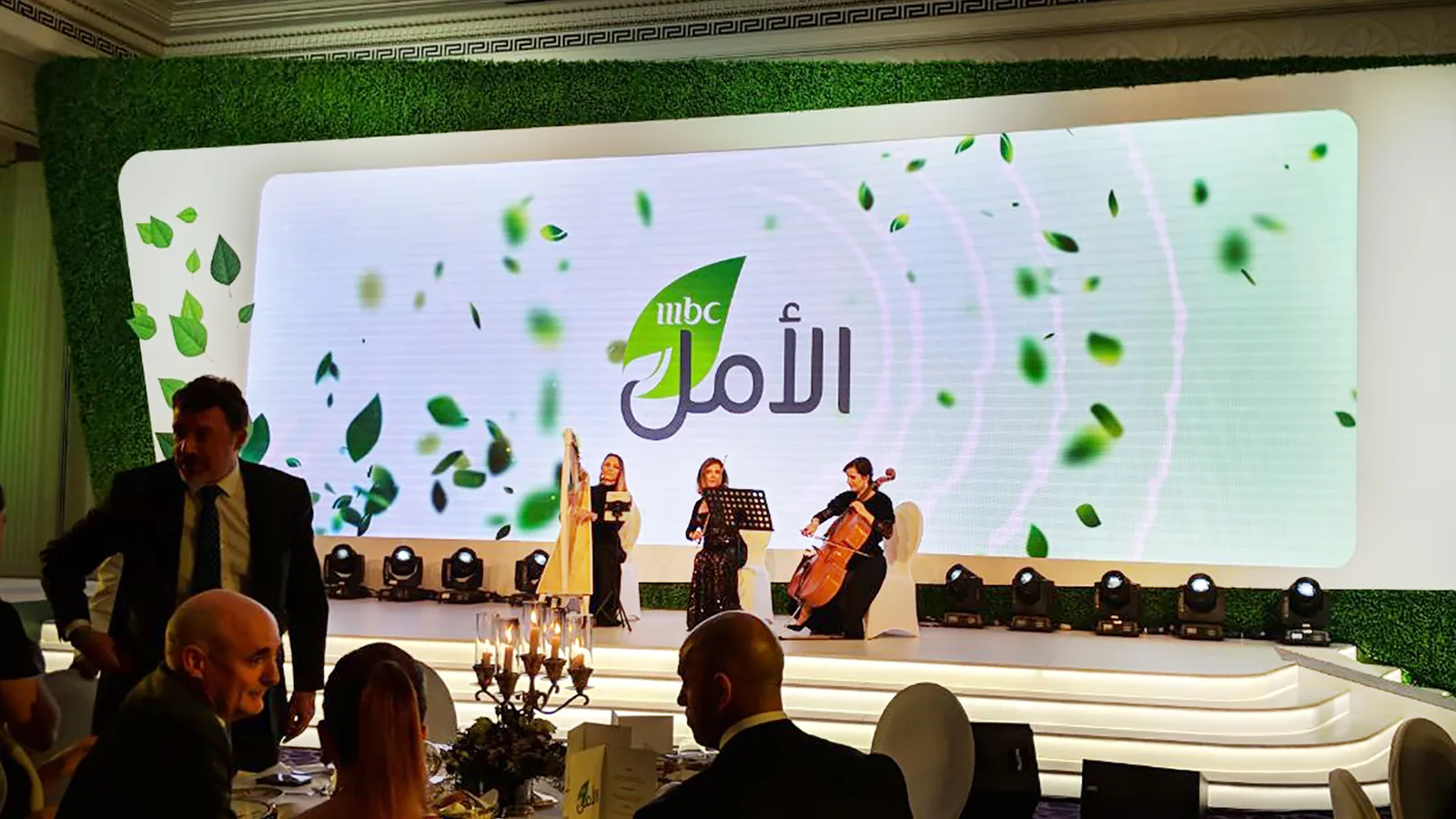 String quartet playing on the leaf themed stage