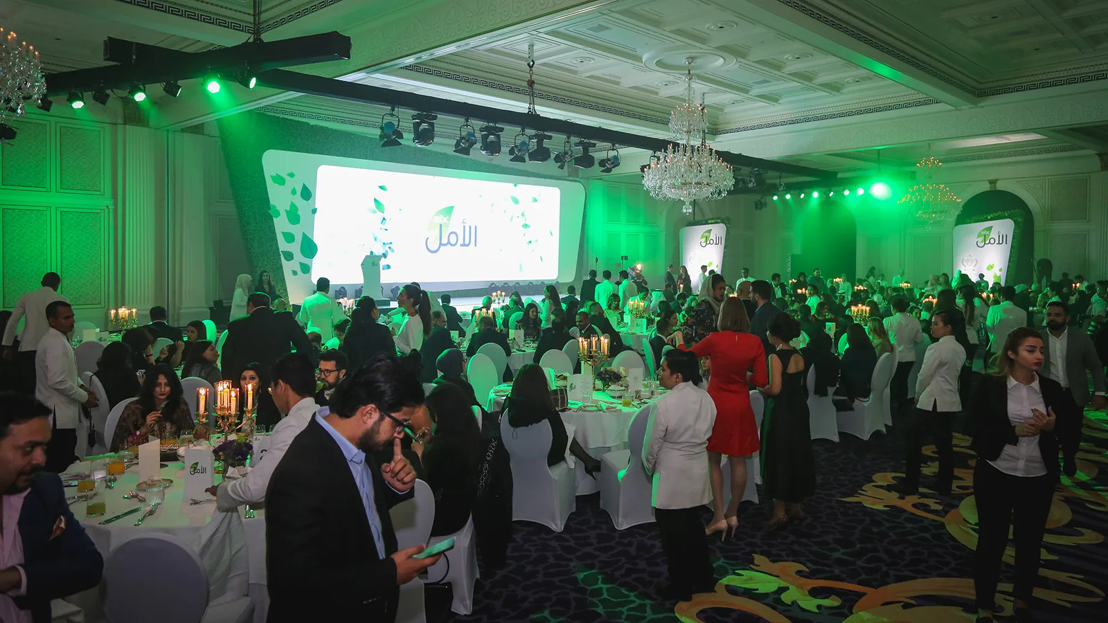 Guests at round tables during the dinner