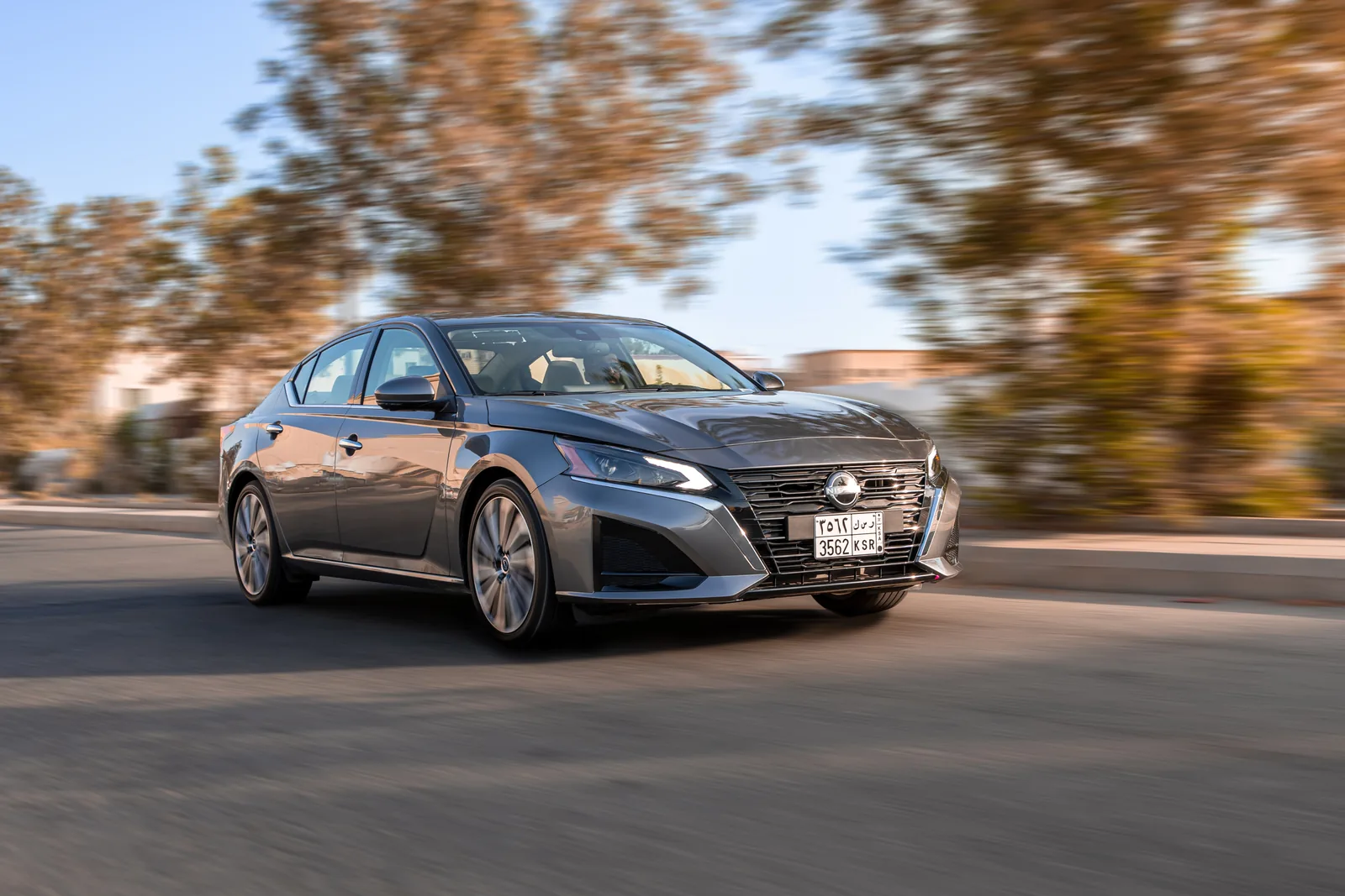 Grey Nissan Altima on the move during the media drive