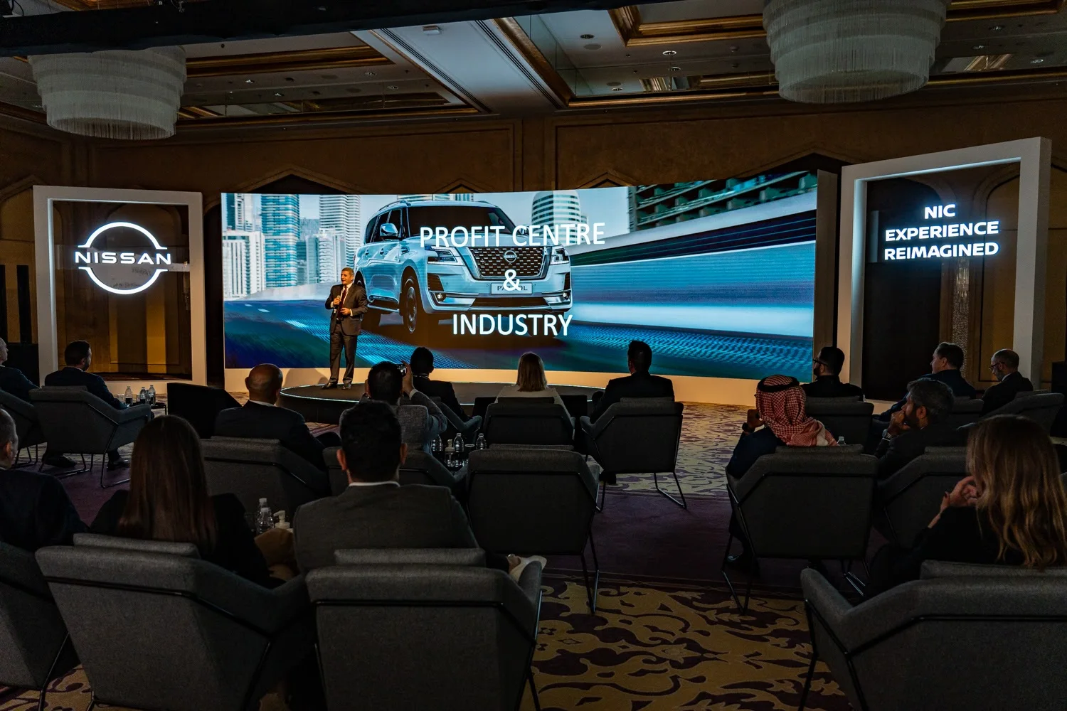 Nissan Intelligent Choice conference set with vehicles and branded screens