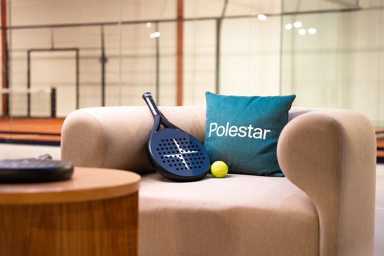 Lounge sofa with a Polestar padel racket